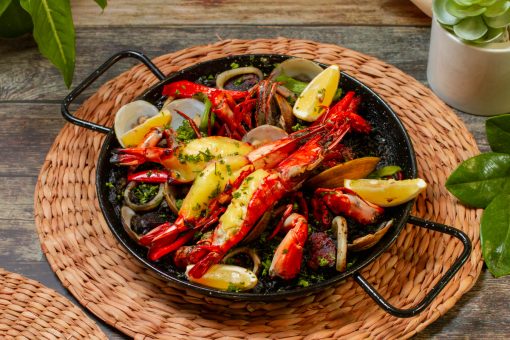 Order seafood paella negra party tray and pay online via CarloPacific.com. Good for 10-12 pax.